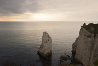 Aiguille d'Etretat rock needle at sunset, Etretat, Alabaster Coast, Seine-Maritime, Normandy,