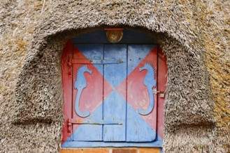 Thatched roof and window with shutters, St. Peter-Ording, Eiderstedt peninsula, North Frisia,