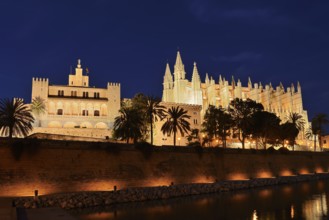 Cathedral La Seu or Cathedral of St Mary and Royal Palace La Almudaina in the evening, Palma de