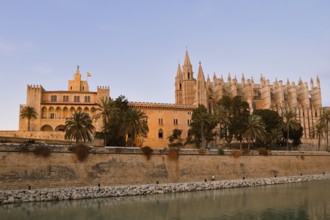Cathedral La Seu or Cathedral of St Mary and Royal Palace La Almudaina in the evening light, Palma