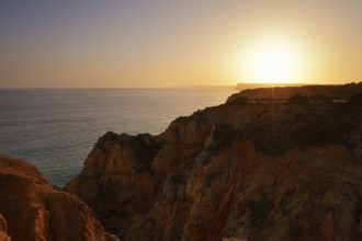 Sunset on the rocky coast, Ponta da Piedade, Lagos, Algarve, Portugal