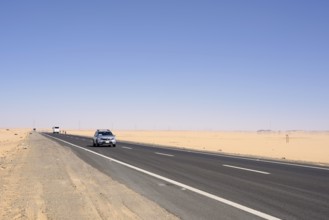 Car on a road in the Arabian Desert, Egypt