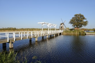 Historic windmill and drawbridge, UNESCO World Heritage Site, Kinderdijk, South Holland,