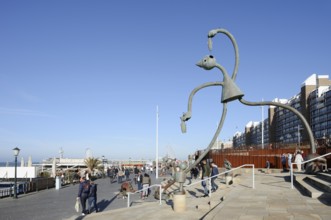 Sculpture Herring Esser by artist Tom Otterness on the seafront promenade, Scheveningen, The Hague,