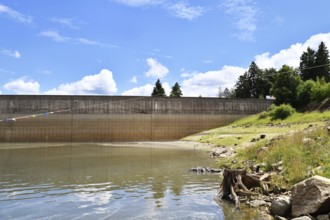 Dam at lake in the Black Forest in Forbach in Germany called Schwarzenbach Reservoir under a clear