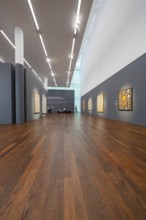 Large exhibition room with paintings on the walls and a wooden floor, Frieder Burda Museum, Baden