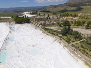 Wide view over limestone terraces and ancient ruins in a picturesque landscape, aerial view, sinter