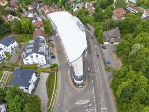 Modern structure in the middle of a green, urban environment photographed from the air, City Centre