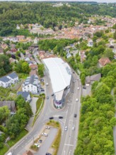 Bird's eye view of buildings and landscape between green forest and tiled roofs, City Centre Calw,