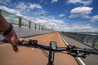 Ride over the Snelbinder Brug bicycle and pedestrian bridge, over the river Waal near Nijmegen, was