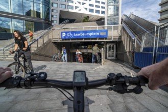 Ride your bike into and out of the bicycle car park at Utrecht Centraal station, Jaarbeursplein,