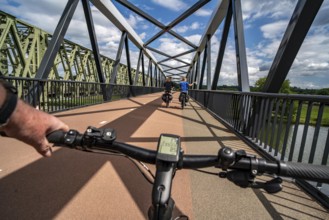 Ride over the De Massover cycle path bridge, over the Meuse south of Nijmegen, near Cuijk, part of