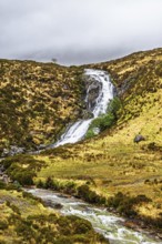Eas a' Bhradain waterfall, Red Cuillin mountains, Loch Ainort, Isle of Skye, Scotland, UK