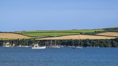 Boats on sea over Knoll Beach Studland, Poole, Dorset, England, United Kingdom