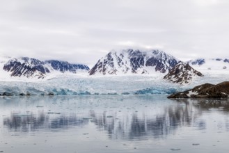 Glacier tongue, mountain range, sea, Smeerenburgbreen, Spitsbergen, Svalbard