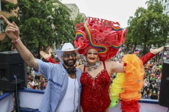 Michelle de la Rose (right) together with a DJ on one of the floats at CSD Berlin under the motto -