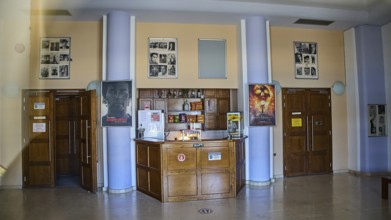 Cinema, An interior with bar, art posters and columns in a cosy ambience, Armando Bernabiti,