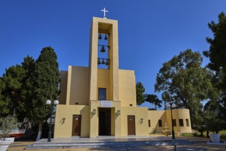Church of Saint Francis, Church of Saint Nicholas, Agios Nikolaos, Yellow church with bells and