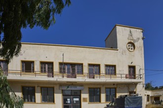 Harbour area, Vintage two-storey building with clock tower and old windows, Armando Bernabiti,