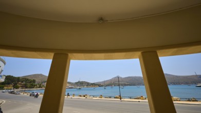 Theatre, Cinema, Circular view of the sea and the mountains from inside a building with columns,