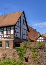 The old town centre with half-timbered houses, church towers and remains of the town wall in