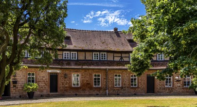The old castle with Barbarossaplatz and the castle café in the old town centre of Büdingen, Hesse,