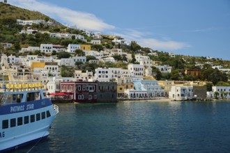 City view from a ship over the blue sea with hilly background landscape, Lakki, Leros, Dodecanese,
