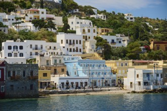 Urban landscape with white and colourful houses on a coast on a hill, Lakki, Leros, Dodecanese,