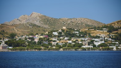 View over a wide coastline with a hill in the background, Lakki, Leros, Dodecanese, Greek Islands,