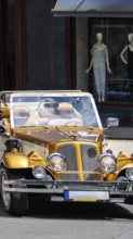 Prague, Old city center, tourism tours and sightseeing in old retro vintage cars