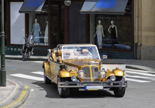 Prague, Old city center, tourism tours and sightseeing in old retro vintage cars