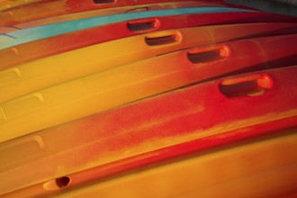 Kayaks, boats, colourful, lying on the beach, Étretat, Normandy, Seine-Maritime, France