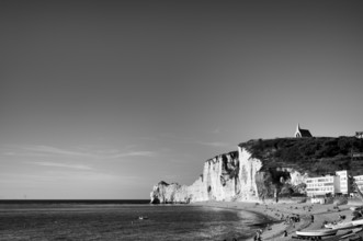 Rowing boat, boats lying on the beach, pebble beach, rock arch Falaise or Porte d'Amont, church