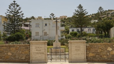 Entrance to Leros War Cemetery with inscriptions and tall trees, Military Cemetery, Commonwealth