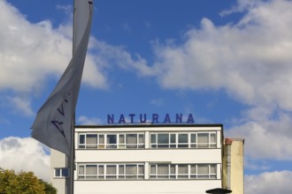 Naturana Miederfabriken, company building of Naturana Dölker Textilbekleidung, lettering, flag,