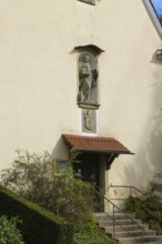 Chapel of St Wolfgang Oberuhldingen, built in 1711, stone figure of St Wolfgang depicted as a