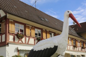 Hotel, Gasthof Storchen, restaurant, replica stork, large sculpture, half-timbered, building,