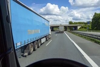 Overtaking manoeuvre by articulated lorry, lorry overtaken, A3 motorway near Nuremberg, Middle