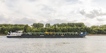 Ship loaded with tractors on the Rhine in Wiesbaden-Biebrich, Rhine navigation, Wiesbaden, Hesse,