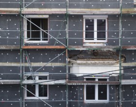 Energetic renovation of an apartment building, renovation of an old building, thermal insulation,