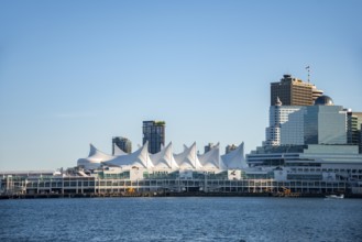 Skyline, skyscrapers and Canada Place on the promenade, Vancouver, British Columbia, Canada