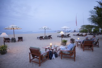 Restaurant on Sanur beach in the evening, Bali, Indonesia