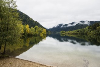 Picturesque mountain lake in autumn, Lac de Longemer, Xonrupt-Longemer, Vosges, Alsace-Lorraine,