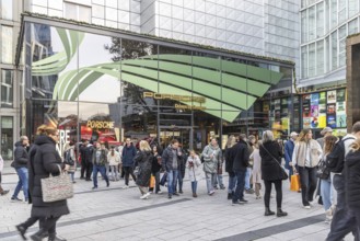 Porsche brand store in the Dorotheen Quartier with passers-by. Stuttgart, Baden-Württemberg,