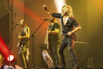 Ande Braun (guitarist), Steffen Haile (bassist) and Hannes Braun (singer) of the band Kissin'