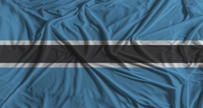 Botswanan flag with fabric texture background. National flag of Botswana with cloth texture