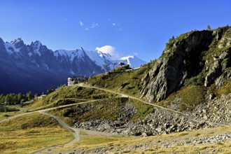 Mountain station of the La Flégère cable car, with the snow-covered Mont Blanc massif at the back,