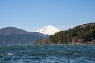 View of Lake Ashi with Mount Fuji volcano and peace torii from Hakone Shrine, Hakone, Japan