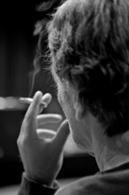 Man with cigarette, smoking, from behind, black and white, rear view, Germany