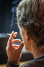 Man with cigarette, smoking, from behind, rear view, Germany